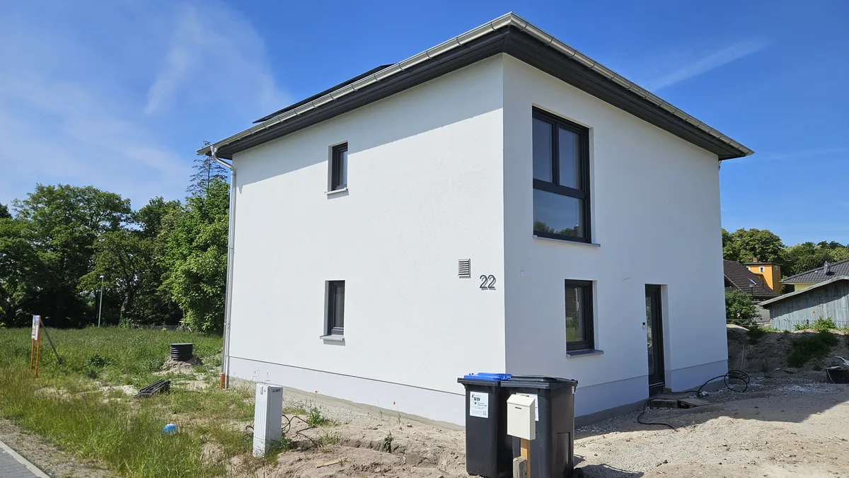Einfamilienhaus mit zentraler Lüftungsanlage in Bad Düben – Blower-Door-Test Referenz